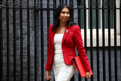 British Home Secretary Suella Braverman walks outside Number 10. Reuters