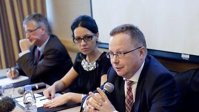 Dubai, United Arab Emirates, March 26, 2013: Zbigniew Nowak, President of the Association of Polish Butchers and Producers of Processed Meat, right, speaks during a news conference at the Grand Hyatt Hotel in Dubai on March 26, 2013. Christopher Pike / The National