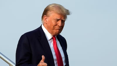 Former US president Donald Trump arrives in Atlanta to be booked for alleged crimes. AP