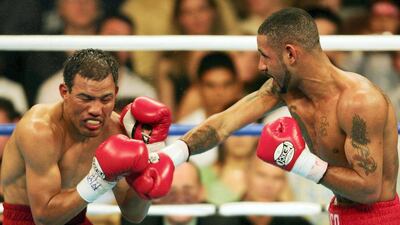 Diego Corrales lands a right on the face of Jose Luis Castillo during their World Lightweight Unification bout on May 7, 2005 at The Mandalay Bay in Las Vegas, Nevada. Corrales won the fight after the referee stopped the fight in the 10th round. Getty Images