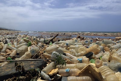 Piles of plastic bottles on the shores of Ouzai, south of Beirut. Joseph Eid / AFP