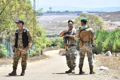 Lebanese troops on a road near Zawtar Al Garhbiyeh. AFP