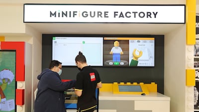 The new Lego Store in The Dubai Mall is home to the region's first Minifigure Factory, which allows visitors to personalise Lego characters. All photos: Pawan Singh / The National