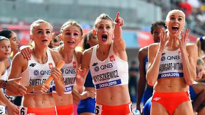 The Polish team celebrate after clinching second place in the women's 4x400m relay final at the IAAF World Athletics Championships at the Khalifa Stadium in Doha, on Sunday October 6. EPA