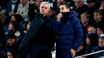 Jose Mourinho talks with assistant head coach Joao Sacramento. AFP