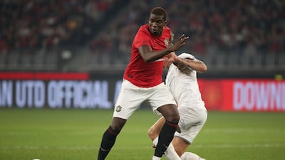 Paul Pogba watches the ball during the clash in Perth. Getty