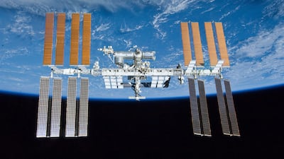 The International Space Station. Astronauts were to remove a faulty electronics box from a communications antenna during their spacewalk. AP