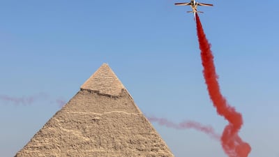 A jet leaves a trail of red.