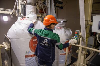 A worker operates a machine to fill sacks of Apaviva NPK(S) phosphate fertilizer at the PhosAgro-Cherepovets fertilizer plant, operated by PhosAgro, in Cherepovets, Russia. Andrey Rudakov/Bloomberg