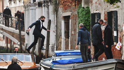 US actor Tom Cruise jumps between two taxiboats during the filming of 'Mission: Impossible 7', which was shot during the pandemic. AFP