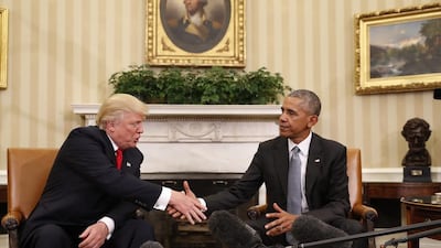 President Barack Obama and president-elect Donald Trump awkwardly shake hands in the Oval Office on November 10, 2016. Pablo Martinez Monsivais/AP Photo