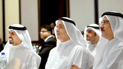 From left: Hamad Buamim, chief executive of the Dubai Chamber of Commerce and Industry, Essa Al Ghurair, chairman of Al Ghurair Resources, and Abdullah Rafia, assistant director general at Dubai Municipality, at the CEO conference in Dubai on Monday. Ravindranath K / The National