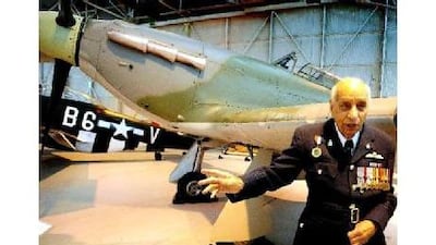 Mahindra Singh Pujji, an Indian national who flew for the British Royal Airforce during the Second World War, stands by a Hurricane. PA Archive