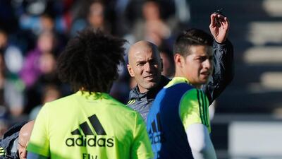 Newly appointed manager of Real Madrid Zinedine Zidane, centre, talks to his players during a Real Madrid training session at Valdebebas training ground on January 5, 2016 in Madrid, Spain. Gonzalo Arroyo Moreno/Getty Images