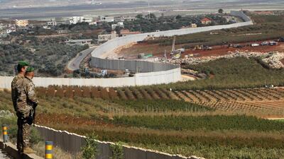 Lebanese soldiers stand near the border with Israel, at the village of Kfar Kila. Reuters