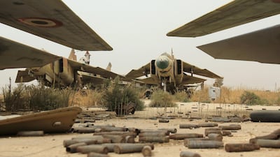 A general view shows former Syrian army MiG-23 fighter jets at the Abu Duhur military airport, the last regime-held military base in northwestern Idlib province. AFP