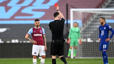 Fabian Balbuena of West Ham United is shown a red card by referee Chris Kavanagh. Getty