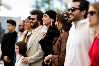 The cast and crew of Woman and Child attend the premiere of the film at the Cannes Film Festival. Reuters