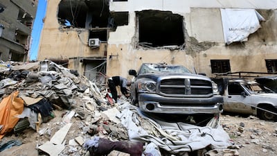 A man inspects a site in the southern port city of Tyre, Lebanon, after it was targeted in an Israeli air strike. EPA