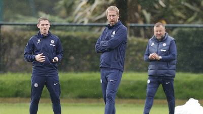 Chelsea manager Graham Potter, centre, with assistant managers Anthony Barry, left, and Billy Reid. PA
