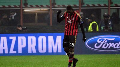 Mario Balotelli and AC Milan finished second behind Barcelona in Group H with nine points from six matches. Giuseppe Cacace / AFP
