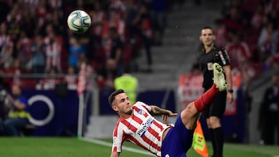 Atletico Madrid's Spanish midfielder Saul Niguez kicks the ball during the Spanish league football match between Club Atletico de Madrid and Real Madrid CF at the Wanda Metropolitano stadium in Madrid on September 28, 2019. / AFP / JAVIER SORIANO