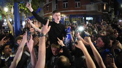 Chelsea supporters celebrate in streets surrounding their Stamford Bridge stadium in London their Champions League victory. AFP