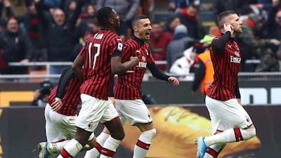 Ante Rebic celebrates his second goal for AC Milan against Udinese. Getty Images