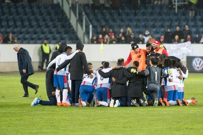 Panama's players try and regroup after their 6-0 thrashing by Switzerland. Urs Flueeler / EPA