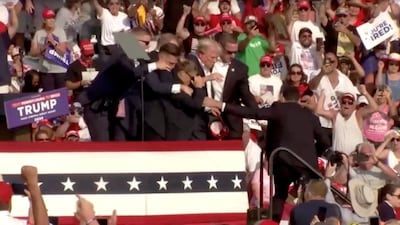 Trump is taken away from rally. ABC/ US Network Pool / Reuters