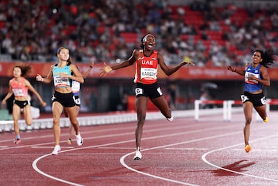 The UAE's Mariam Kareem, in red, set a new Asian Games record in the women's 400m hurdles final. Getty Images