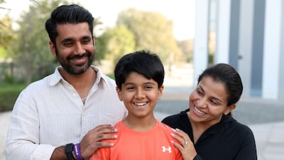 Ayaan with his parents, Vani Mendon and Saboor Ahmad, who are part of his climbing team. Chris Whiteoak / The National