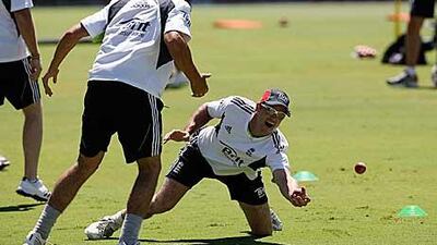 Andrew Strauss, right,the England captain, catches a ball during training at the Waca ground in Perth, ahead of the third Ashes Test match against Australia, which starts tomorrow.