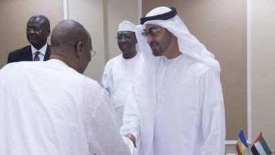 Sheikh Mohammed bin Zayed greets an official accompanying the Chad president Idriss Deby, back centre. Rashed Al Mansoori / Crown Prince Court - Abu Dhabi