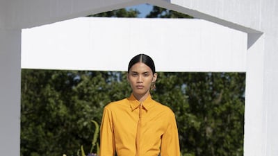 A jolt of marigold yellow, laser cut to resemble an army camouflage net, as part of Qasimi spring / summer 2022 collection. Courtesy Qasimi