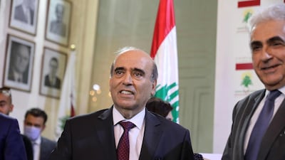 Charbel Wahbi, Lebanon’s new foreign minister, stands next to his predecessor Nassif Hitti in Beirut on August 4, 2020. AFP