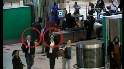 An image taken from a video shows two suspects in Dubai Airport who were allegedly involved in the Hamas leader killing last month.