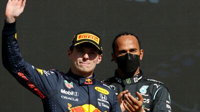 Max Verstappen of Red Bull celebrates first place next to Lewis Hamilton after the Mexican Grand Prix. EPA