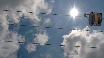The cable car is a river crossing that travels a distance of 1.1km at heights of up to 90 metres between Greenwich and the Royal Docks. AFP