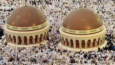 Pilgrims perform evening prayers in Mecca's Grand Mosque in the holy city of Mecca, Saudi Arabia. Fayez Nureldine / AFP