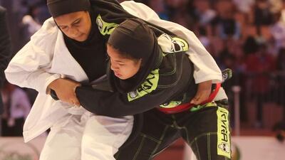 Alia Mohammed Salem, left, of the UAE shown in her match with Lolwa Al Shamsi of the UAE in the Abu Dhabi World Youth Jiu-Jitsu Championship 2016. Ravindranath / The National