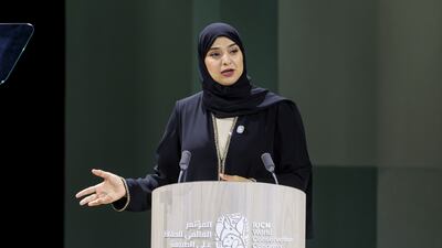 Dr Amna Al Dahak, Minister of Climate Change and Environment, speaks on the opening day of the World Conservation Congress in Abu Dhabi. Victor Besa / The National