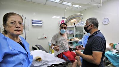 A man injured in the Beirut Port explosion receives treatment at Najjar Hospital in Al-Hamra area in Beirut, Lebanon, 4 August 2020. EPA