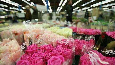 A lot of people go for roses but for the financially (or romantically) challenged, there are always Valentine's cards. Dan Kitwood / Getty