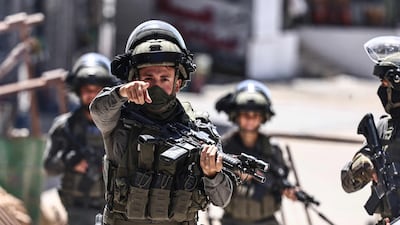 Israeli forces raid the Qalandiya refugee camp, south of Ramallah, in the occupied West Bank last month. AFP