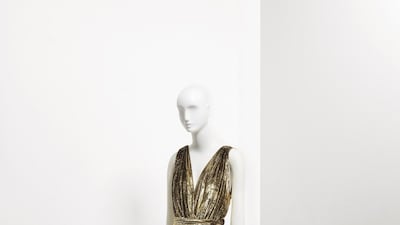 Evening dress in gold lurex velvet, spring-summer 1995. Courtesy of Christie's