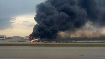 The plane is seen on fire after an emergency landing at the Sheremetyevo Airport outside Moscow. Reuters