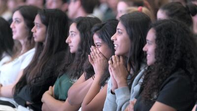 Students attend the Haitham Zamzam Al Hammadi Medal of International Friendship ceremony at the American Community School.
