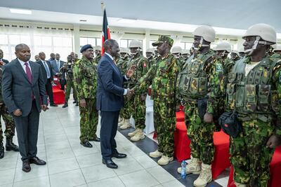 Kenya's President William Ruto speaks to police officers at the National Police College before their departure for Haiti, in Nairobi. EPA / Presidential Communication Service