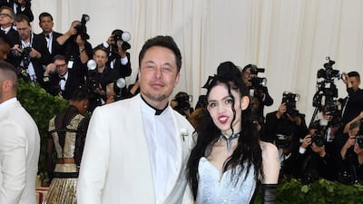 Elon Musk and Grimes made their debut as a couple on the red carpet - and the pair reportedly designed Canadian musician Grimes' dress together. AFP